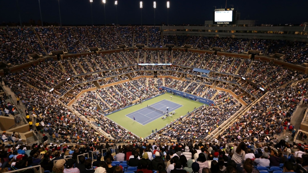 Packed Arthur Ashe Stadium during a night tennis match at the US Open