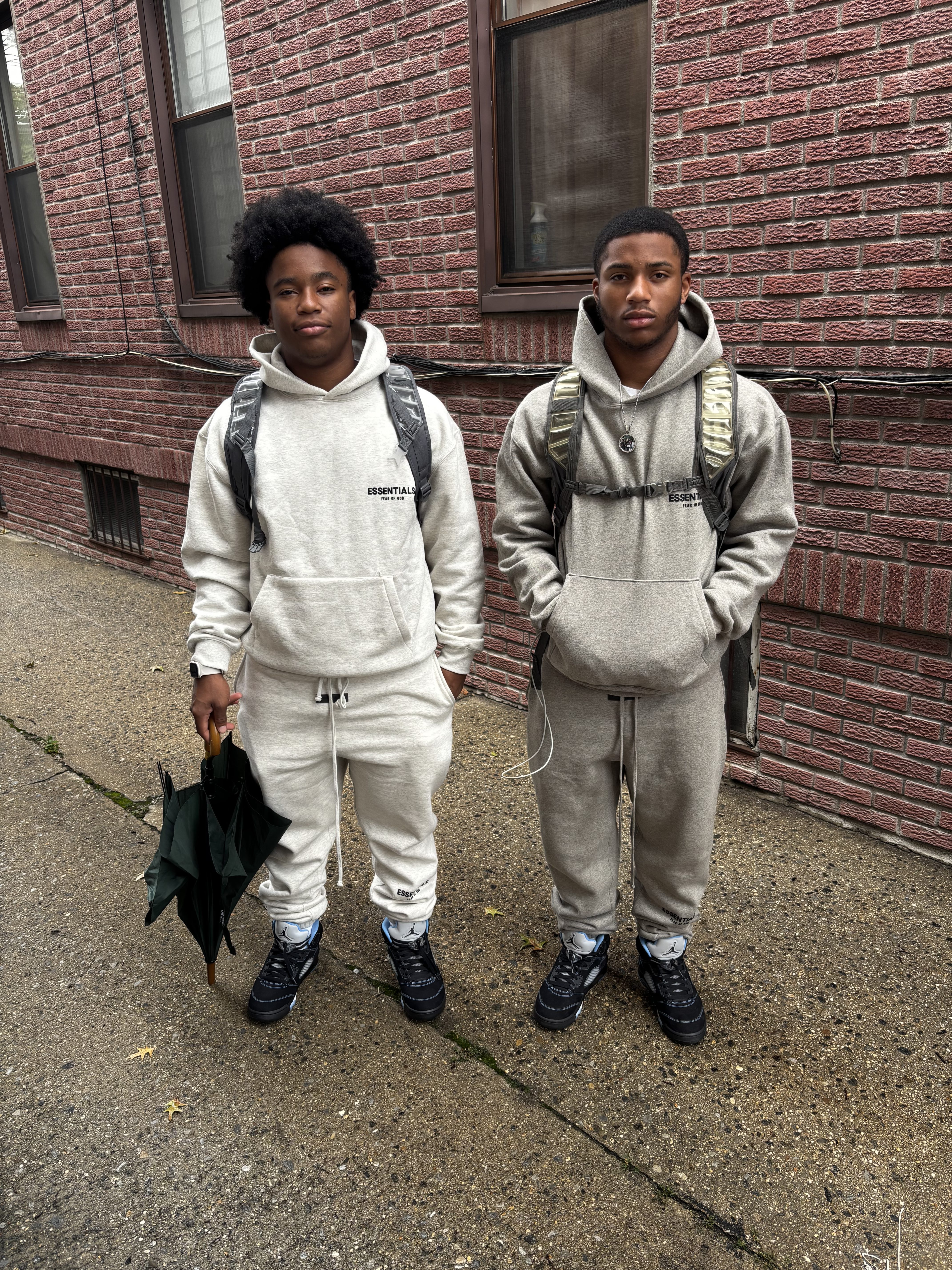Tristan Smith on the left and Trevor Smith Jr. on the right, standing together